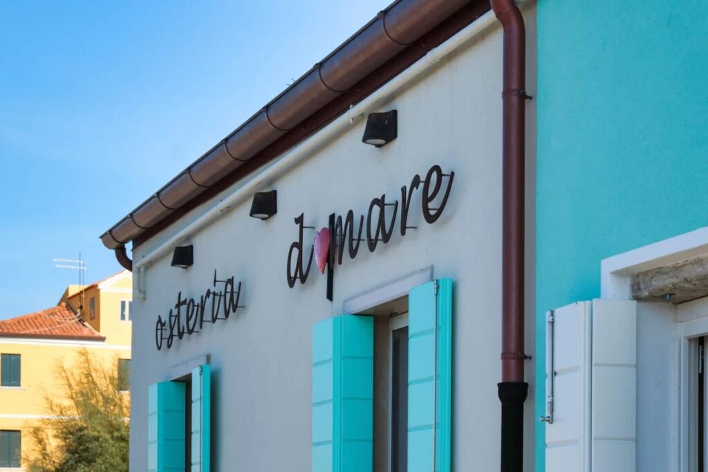 Osteria Damare insegna